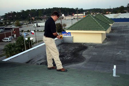 John Minor Inspecting Roof