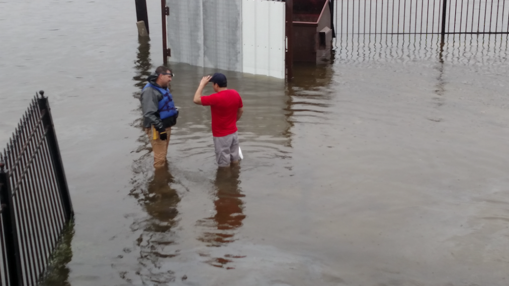 John Minor CFM floodplain management in Houston with a new friend on his daily loop of Hunting Bayou, Houston, TX